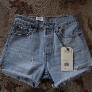 Light wash Levi’s denim high-waisted shorts